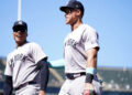 New York Yankees center fielder Aaron Judge (99) and right fielder Juan Soto (22) walk towards the dugout before the start of the fourth inning against the Oakland Athletics at the Oakland-Alameda County Coliseum. Mandatory Credit: Cary Edmondson-Imagn Images