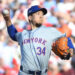 Oct 5, 2024; Philadelphia, PA, USA; New York Mets pitcher Kodai Senga (34) throws a pitch against the Philadelphia Phillies in the first inning in game one of the NLDS for the 2024 MLB Playoffs at Citizens Bank Park. Mandatory Credit: Eric Hartline-Imagn Images