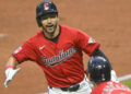 Sep 25, 2024; Cleveland, Ohio, USA; Cleveland Guardians left fielder Steven Kwan (38) celebrates his solo home run with designated hitter Kyle Manzardo (9) in the first inning against the Cincinnati Reds at Progressive Field. Mandatory Credit: David Richard-Imagn Images