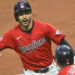 Sep 25, 2024; Cleveland, Ohio, USA; Cleveland Guardians left fielder Steven Kwan (38) celebrates his solo home run with designated hitter Kyle Manzardo (9) in the first inning against the Cincinnati Reds at Progressive Field. Mandatory Credit: David Richard-Imagn Images