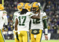 Dec 19, 2021; Baltimore, Maryland, USA; Green Bay Packers wide receiver Davante Adams (17) celebrates with quarterback Aaron Rodgers (12) after scoring a second quarter touchdown against the Baltimore Ravens at M&amp;T Bank Stadium. Mandatory Credit: Tommy Gilligan-Imagn Images