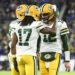 Dec 19, 2021; Baltimore, Maryland, USA; Green Bay Packers wide receiver Davante Adams (17) celebrates with quarterback Aaron Rodgers (12) after scoring a second quarter touchdown against the Baltimore Ravens at M&amp;T Bank Stadium. Mandatory Credit: Tommy Gilligan-Imagn Images