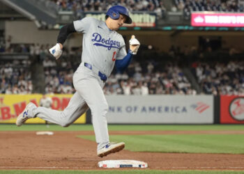 Jun 8, 2024; Bronx, New York, USA; Los Angeles Dodgers designated hitter Shohei Ohtani (17) rounds third base and scores on an double by first baseman Freddie Freeman (not pictured) during the ninth inning against the New York Yankees at Yankee Stadium. Mandatory Credit: Vincent Carchietta-Imagn Images