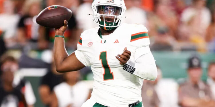 Sep 21, 2024; Tampa, Florida, USA; Miami Hurricanes quarterback Cam Ward (1) drops back to pass against the South Florida Bulls in the second quarter at Raymond James Stadium. Mandatory Credit: Nathan Ray Seebeck-Imagn Images