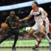 Oct 24, 2024; Washington, District of Columbia, USA; Boston Celtics guard Jaylen Brown (7) drives to the basket as Washington Wizards forward Kyshawn George (18) defends in the first half at Capital One Arena. Mandatory Credit: Geoff Burke-Imagn Images