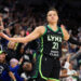 Oct 8, 2024; Minneapolis, Minnesota, USA; Minnesota Lynx guard Kayla McBride (21) celebrates her 3-point basket against the Connecticut Sun during the first half of game five of the 2024 WNBA playoffs at Target Center. Mandatory Credit: Matt Krohn-Imagn Images