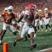 AUSTIN, TX - OCTOBER 19: Georgia Bulldogs running back Trevor Etienne (1) runs runs to the corner of the end zone for a touchdown during the SEC college football game between Texas Longhorns and Georgia Bulldogs on October 19, 2024, at Darrell K Royal - Texas Memorial Stadium in Austin, TX.  (Photo by David Buono/Icon Sportswire via Getty Images)