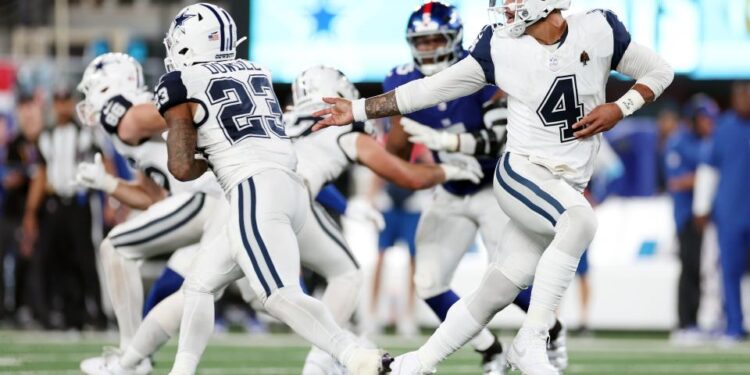 EAST RUTHERFORD, NEW JERSEY - SEPTEMBER 26: Dak Prescott #4 of the Dallas Cowboys in action during the game against the New York Giants at MetLife Stadium on September 26, 2024 in East Rutherford, New Jersey. (Photo by Sarah Stier/Getty Images)