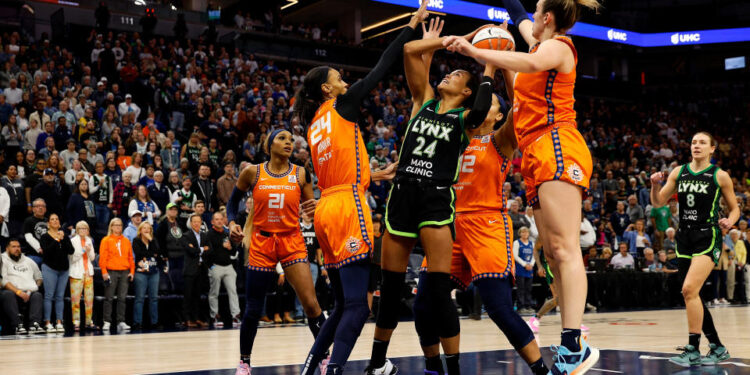 MINNEAPOLIS, MINNESOTA - OCTOBER 01: Napheesa Collier #24 of the Minnesota Lynx goes up for a shot against the Connecticut Sun in the first quarter of Game Two of the Semi-Finals during the WNBA Playoffs at Target Center on October 01, 2024 in Minneapolis, Minnesota. NOTE TO USER: User expressly acknowledges and agrees that, by downloading and or using this photograph, User is consenting to the terms and conditions of the Getty Images License Agreement. (Photo by David Berding/Getty Images)