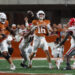 AUSTIN, TX - OCTOBER 19: Georgia Bulldogs linebacker Jalon Walker (11) forces a fumble on Texas Longhorns quarterback Arch Manning (16) during the SEC college football game between Texas Longhorns and Georgia Bulldogs on October 19, 2024, at Darrell K Royal - Texas Memorial Stadium in Austin, TX.  (Photo by David Buono/Icon Sportswire via Getty Images)