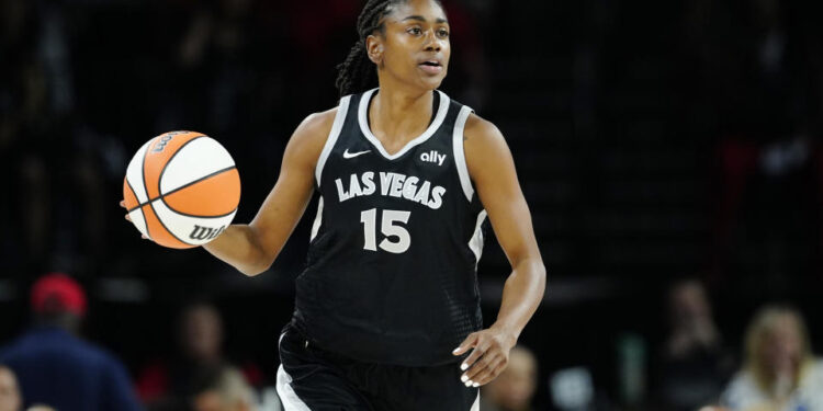 LAS VEGAS, NEVADA - SEPTEMBER 19: Tiffany Hayes #15 of the Las Vegas Aces brings the ball up court in the first quarter against the Dallas Wings at Michelob ULTRA Arena on September 19, 2024 in Las Vegas, Nevada. NOTE TO USER: User expressly acknowledges and agrees that, by downloading and or using this photograph, User is consenting to the terms and conditions of the Getty Images License Agreement. (Photo by Louis Grasse/Getty Images)