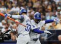 Dodgers Mookie Betts celebrates with Teoscar Hernandez after hitting a solo home run during Game 4