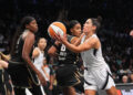 Sep 29, 2024; Brooklyn, New York, USA; Las Vegas Aces guard Kelsey Plum (10) shoots a layup against the New York Liberty during game one of the 2024 WNBA Semi-finals at Barclays Center. Mandatory Credit: Gregory Fisher-Imagn Images