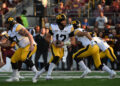 MINNEAPOLIS, MN - SEPTEMBER 21: Iowa Hawkeyes QB Cade McNamara (12) drops back to pass during game between the Iowa Hawkeyes and the Minnesota Golden Gophers on September 21, 2024, at Huntington Bank Stadium in Minneapolis, MN. (Photo by John Rivera/Icon Sportswire via Getty Images)