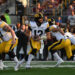 MINNEAPOLIS, MN - SEPTEMBER 21: Iowa Hawkeyes QB Cade McNamara (12) drops back to pass during game between the Iowa Hawkeyes and the Minnesota Golden Gophers on September 21, 2024, at Huntington Bank Stadium in Minneapolis, MN. (Photo by John Rivera/Icon Sportswire via Getty Images)