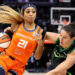 Oct 1, 2024; Minneapolis, Minnesota, USA; Connecticut Sun guard DiJonai Carrington (21) works around Minnesota Lynx forward Cecilia Zandalasini (9) during the second half of game two of the 2024 WNBA Semi-finals at Target Center. Mandatory Credit: Matt Krohn-Imagn Images     TPX IMAGES OF THE DAY