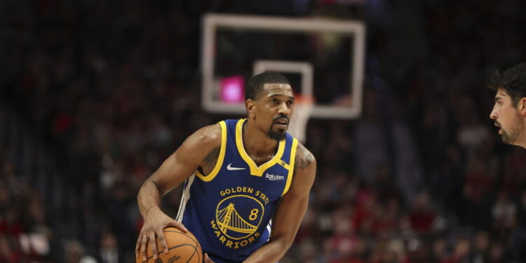 Golden State Warriors guard De'Anthony Melton (8) plays during an NBA basketball game against the Portland Trail Blazers Wednesday, Oct. 23, 2024, in Portland, Ore. The Golden State Warriors won 139-104. (AP Photo/Amanda Loman)