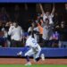 NEW YORK, NEW YORK - OCTOBER 18: The New York Mets cheer as Mookie Betts #50 of the Los Angeles Dodgers attempts to corral the ball hit by Jesse Winker #3 during the eighth inning in game five of the National League Championship Series at Citi Field on Friday, Oct. 18, 2024 in New York. (Robert Gauthier / Los Angeles Times)