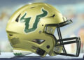 BOCA RATON, FL - DECEMBER 21: South Florida Bulls helmet rests near the sidelines during the RoomClaim.com Boca Raton Bowl game between the Syracuse Orange and the South Florida (USF) Bulls (Photo by Peter Joneleit/Icon Sportswire via Getty Images)