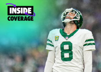 New York Jets quarterback Aaron Rodgers (8) reacts during an NFL football game against the Minnesota Vikings at Tottenham Hotspur Stadium, Sunday, Oct. 6, 2024 in London. (AP Photo/Steve Luciano)