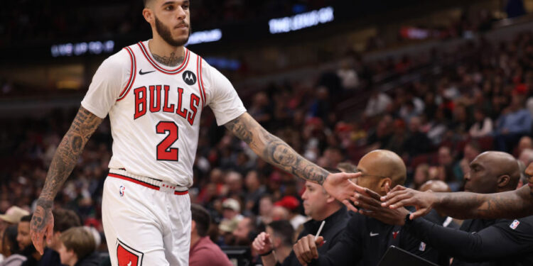 Chicago Bulls guard Lonzo Ball heads to the bench in the first quarter of a preseason game against the Cleveland Cavaliers at the United Center on Oct. 18, 2024, in Chicago. (John J. Kim/Chicago Tribune/Tribune News Service via Getty Images)