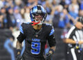 DETROIT, MI - SEPTEMBER 30:  Detroit Lions wide receiver Jameson Williams (9) looks on as he jogs to the sideline after scoring a touchdown on a 70-yard catch-and-run pass play during the third quarter of an NFL Monday Night Football regular season football game between the Seattle Seahawks and the Detroit Lions on September 30, 2024 at Ford Field in Detroit, Michigan. (Photo by Scott W. Grau/Icon Sportswire via Getty Images)