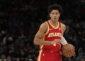 CHICAGO, ILLINOIS - APRIL 01: Jalen Johnson #1 of the Atlanta Hawks dribbles the ball during the first half against the Chicago Bulls at the United Center on April 01, 2024 in Chicago, Illinois. NOTE TO USER: User expressly acknowledges and agrees that, by downloading and or using this photograph, User is consenting to the terms and conditions of the Getty Images License Agreement. (Photo by Patrick McDermott/Getty Images)