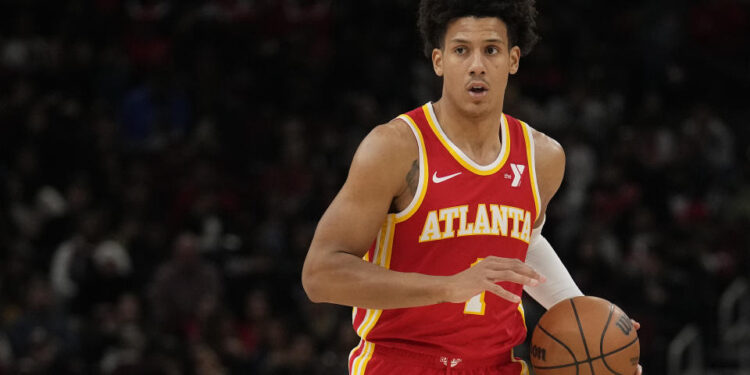 CHICAGO, ILLINOIS - APRIL 01: Jalen Johnson #1 of the Atlanta Hawks dribbles the ball during the first half against the Chicago Bulls at the United Center on April 01, 2024 in Chicago, Illinois. NOTE TO USER: User expressly acknowledges and agrees that, by downloading and or using this photograph, User is consenting to the terms and conditions of the Getty Images License Agreement. (Photo by Patrick McDermott/Getty Images)