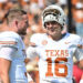 DALLAS, TEXAS - OCTOBER 12: Arch Manning #16 and Quinn Ewers #3 of the Texas Longhorns talk on the field before a game O at Cotton Bowl Stadium on October 12, 2024 in Dallas, Texas. (Photo by Sam Hodde/Getty Images)