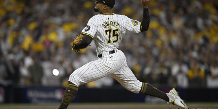 Oct 2, 2024; San Diego, California, USA; San Diego Padres pitcher Robert Suarez (75) throws during the ninth inning of game two in the Wildcard round for the 2024 MLB Playoffs against the Atlanta Braves at Petco Park. Mandatory Credit: Denis Poroy-Imagn Images