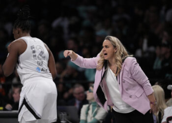 New York Liberty head coach Becky Hammon during the first half of a WNBA basketball semifinal game against the New York Liberty, Tuesday, Oct. 1, 2024, in New York. (AP Photo/Frank Franklin II)