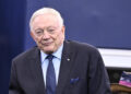 Dallas Cowboys team owner Jerry Jones stands on the field during warmups before an NFL football game against the Detroit Lions in Arlington, Texas, Sunday, Oct. 13, 2024. (AP Photo/Jerome Miron)