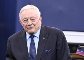 Dallas Cowboys team owner Jerry Jones stands on the field during warmups before an NFL football game against the Detroit Lions in Arlington, Texas, Sunday, Oct. 13, 2024. (AP Photo/Jerome Miron)