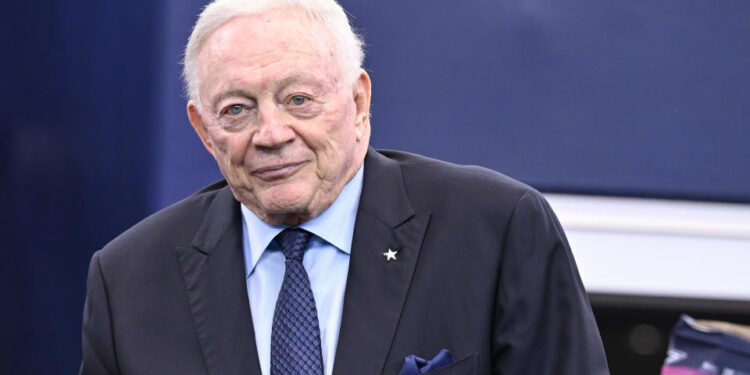 Dallas Cowboys team owner Jerry Jones stands on the field during warmups before an NFL football game against the Detroit Lions in Arlington, Texas, Sunday, Oct. 13, 2024. (AP Photo/Jerome Miron)