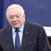 Dallas Cowboys team owner Jerry Jones stands on the field during warmups before an NFL football game against the Detroit Lions in Arlington, Texas, Sunday, Oct. 13, 2024. (AP Photo/Jerome Miron)