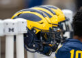 ANN ARBOR, MICHIGAN - APRIL 20: Michigan Football helmets displayed behind the Blue Team bench during the Michigan Football Spring Game at Michigan Stadium on April 20, 2024 in Ann Arbor, Michigan. (Photo by Jaime Crawford/Getty Images)