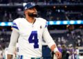 Dak Prescott walks off the field