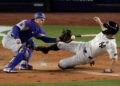 Giancarlo Stanton was easily thrown out at home in the fourth inning of World Series Game 3. (AP Photo/Frank Franklin II)