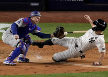 Giancarlo Stanton was easily thrown out at home in the fourth inning of World Series Game 3. (AP Photo/Frank Franklin II)