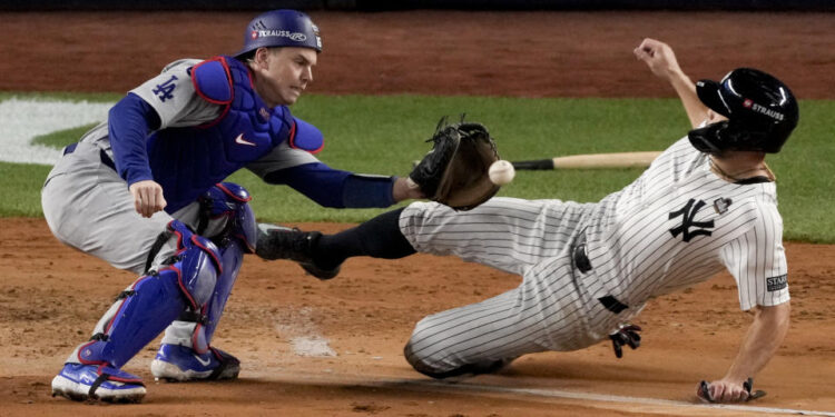 Giancarlo Stanton was easily thrown out at home in the fourth inning of World Series Game 3. (AP Photo/Frank Franklin II)