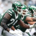 EAST RUTHERFORD, NEW JERSEY - SEPTEMBER 29: Olu Fashanu #74 of the New York Jets in action against the Denver Broncos at MetLife Stadium on September 29, 2024 in East Rutherford, New Jersey. (Photo by Luke Hales/Getty Images)