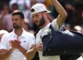 Jacob Fearnley is clapped off Centre Court by Novak Djokovic