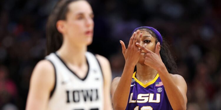 Angel Reese of the LSU Lady Tigers reacts towards Caitlin Clark