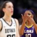 Angel Reese of the LSU Lady Tigers reacts towards Caitlin Clark