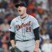 Tigers pitcher reacts during a game