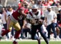 Jacoby Brissett tackled by Kevin Givens