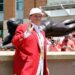 Pete Rose waves to fans