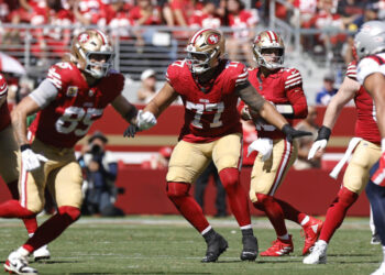 SANTA CLARA, CA - SEPTEMBER 29: Dominick Puni #77 of the San Francisco 49ers blocks during the game against the New England Patriots at Levi's Stadium on September 29, 2024 in Santa Clara, California. The 49ers defeated the Patriots 30-13. (Photo by Michael Zagaris/San Francisco 49ers/Getty Images)