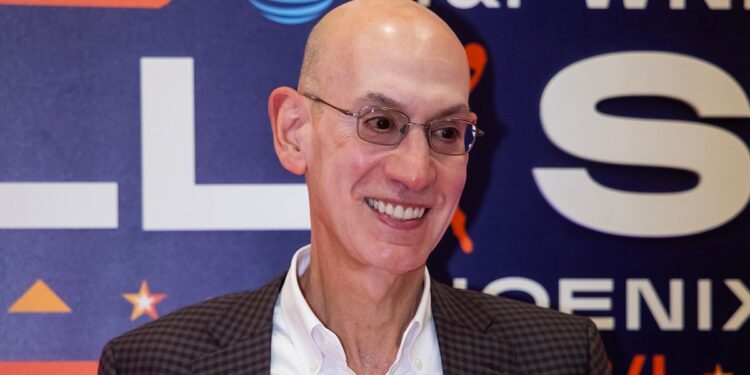 Adam Silver smiles