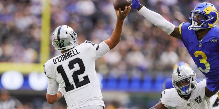 Aidan OConnell tries to throw pass